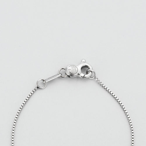 Collier Chaîne et pendentif en or gris, trois diamants. 58 Facettes DV0617-1