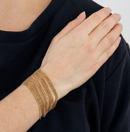 Bracelet Bracelet souple avec nombreuses chainettes en or jaune perlé 58 Facettes DV0624-17