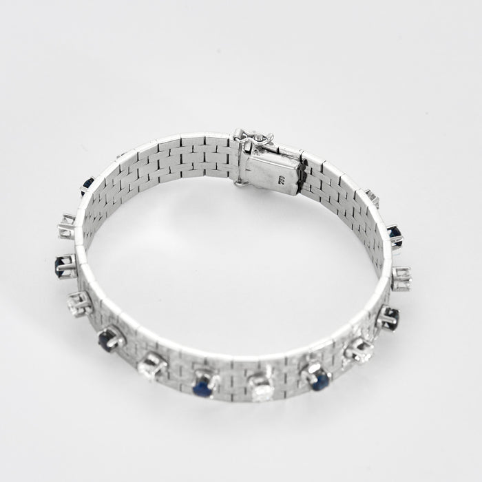 Bracelet or gris diamants et saphirs