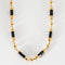 Collier Collier en or jaune et onyx 58 Facettes DV1164-5