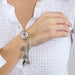 Bracelet CHANEL - Camélia - Bracelet en or gris, diamants 58 Facettes DV0615- 4