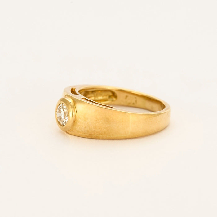 Yellow gold and diamond bangle ring