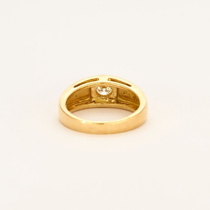 Yellow gold and diamond bangle ring