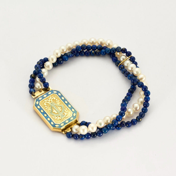 Bracelet Bracelet or jaune 18K,perles blanches et de lapis-lazuli 58 Facettes DV5673-3