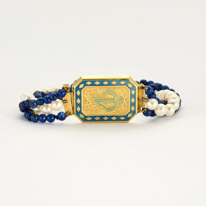 Bracelet Bracelet or jaune 18K,perles blanches et de lapis-lazuli 58 Facettes DV5673-3