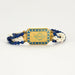 Bracelet Bracelet or jaune 18K,perles blanches et de lapis-lazuli 58 Facettes DV5673-3