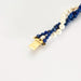 Bracelet Bracelet or jaune 18K,perles blanches et de lapis-lazuli 58 Facettes DV5673-3