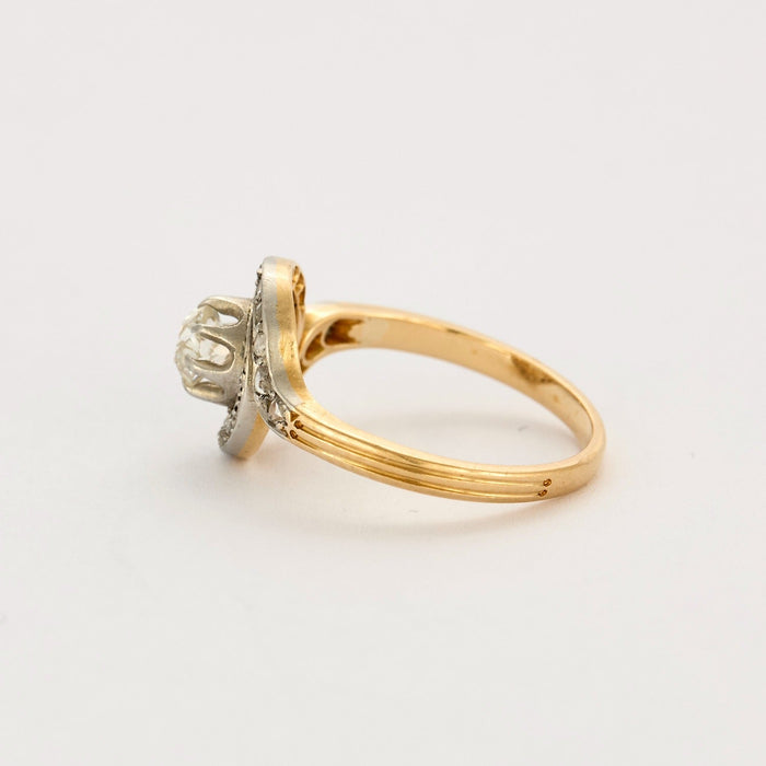 Gold and diamond swirl ring