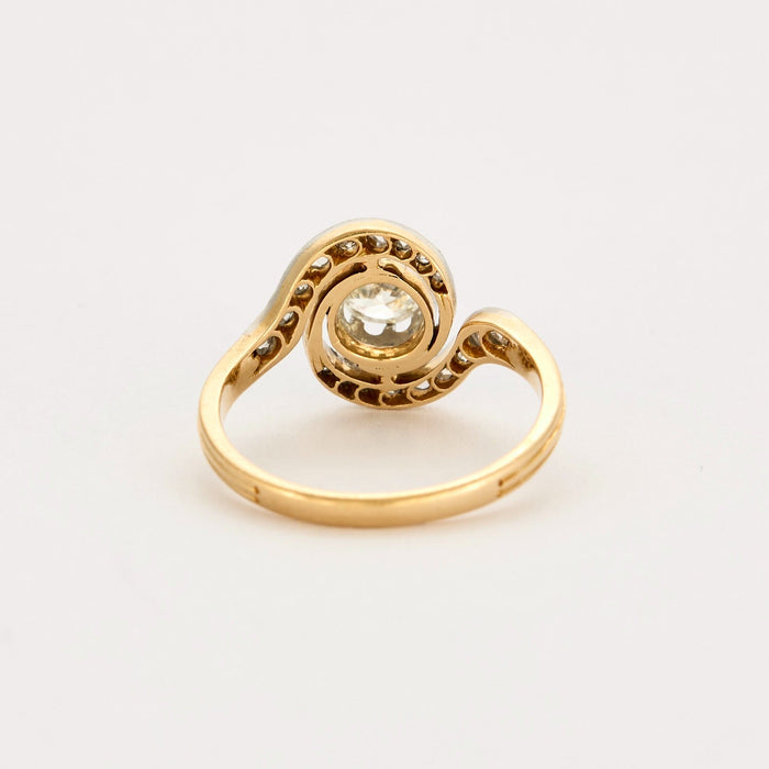 Gold and diamond swirl ring