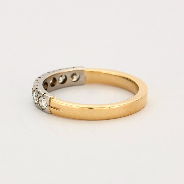 Half wedding ring with diamonds, yellow and gray gold