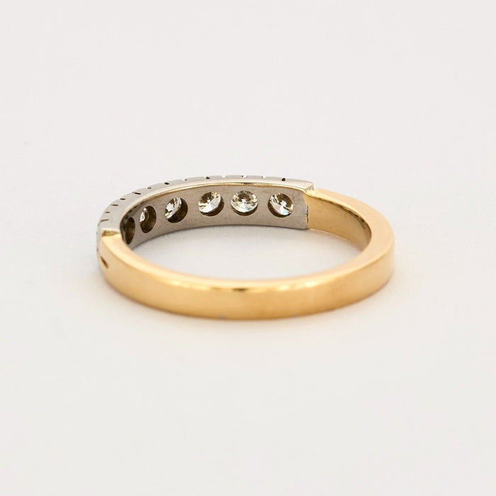 Half wedding ring with diamonds, yellow and gray gold