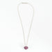 Collier CHOPARD - Collier pendentif Coeur or blanc et saphirs roses 58 Facettes DV0822-1