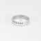 Bague demi-alliance en or blanc et diamants