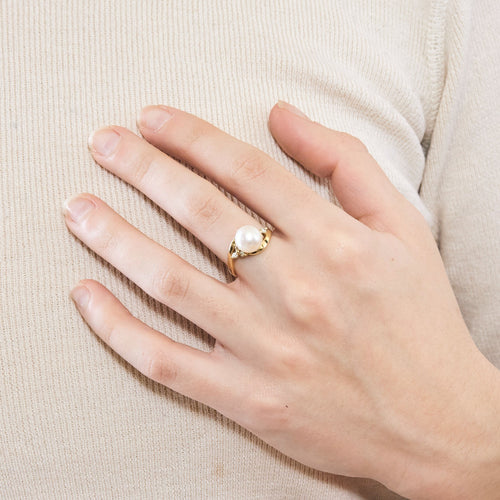 Bague en or jaune, perle de culture et diamants