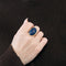 Bague 50 Bague en or jaune et pierre d'imitation bleue. 58 Facettes DV0654-4-50-2