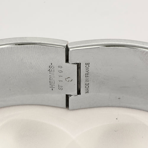 HERMES - Clic H - Bracelet en métal argenté palladié émaillé rouge