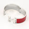 HERMES - Clic H - Bracelet en métal argenté palladié émaillé rouge