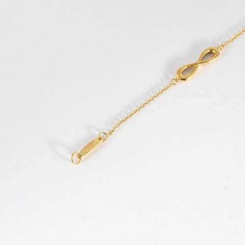 Bracelet TIFFANY & CO- Bracelet Infiniti - or jaune 58 Facettes DV10358-5