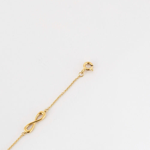 Bracelet TIFFANY & CO- Bracelet Infiniti - or jaune 58 Facettes DV10358-5