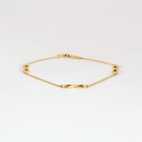 Bracelet TIFFANY & CO- Bracelet Infiniti - or jaune 58 Facettes DV10358-5