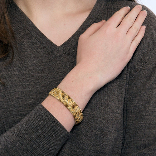 Bracelet Bracelet ruban souple, maille tressée en or jaune 58 Facettes DDV3285-1