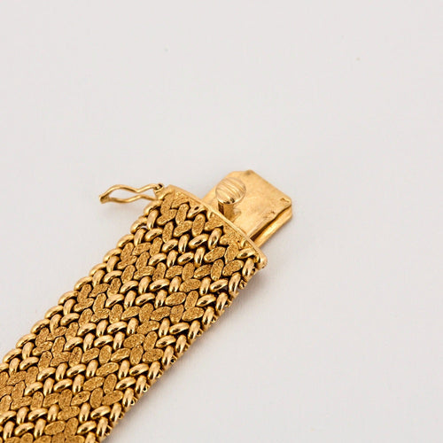 Bracelet Bracelet ruban souple, maille tressée en or jaune 58 Facettes DDV3285-1