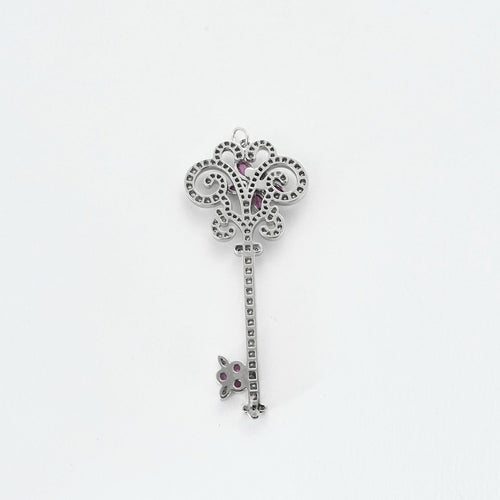 Pendentif TIFFANY & Co - Pendentif  clef "dragon fly" platine, diamants, saphir 58 Facettes DV0707-4