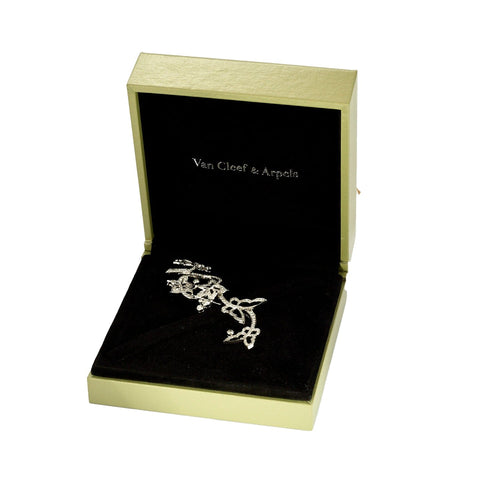 Broche VAN CLEEF & Arpels - Broche en or blanc et diamants à motif de fleurs, de papillons 58 Facettes DV4479-16
