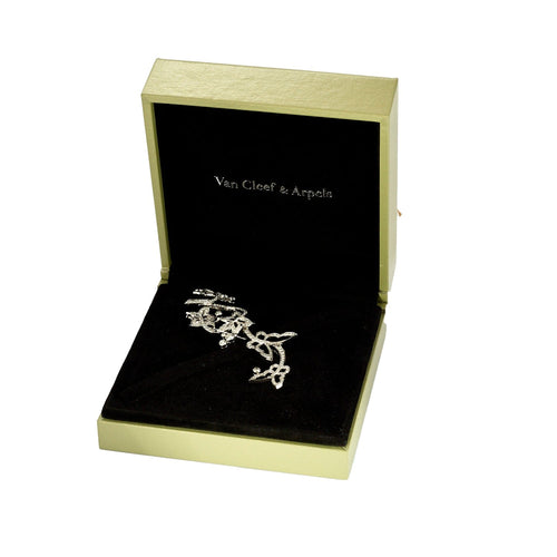 Broche VAN CLEEF & Arpels - Broche en or blanc et diamants à motif de fleurs, de papillons 58 Facettes DV4479-16