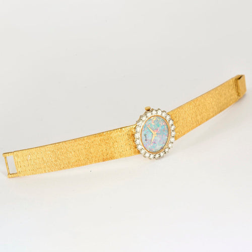 Montre PIAGET - Extraplate Joaillerie - Montre de dame Or Jaune, Opale, Diamants 58 Facettes DV4479-33