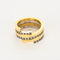 DINH VAN - Duo Spirale - Bague or jaune, or gris et diamants noirs