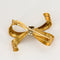 Broche Broche noeud or jaune et diamants 58 Facettes DV14293-1