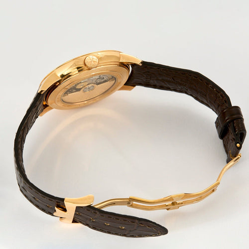 Montre VACHERON CONSTANTIN - Heures Sautantes - Montre d'homme en or rose 58 Facettes DV4479-25