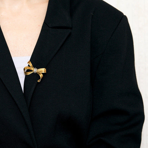 Broche Broche noeud or jaune et diamants 58 Facettes DV14293-1