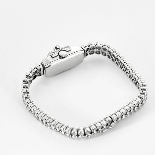 Montre Montre bracelet à secret en or blanc, platine et diamants 58 Facettes DV0872-2