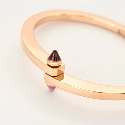 Bracelet CARTIER - Menottes - Bracelet en or jaune et grenat 58 Facettes DV3419-23