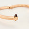 Bracelet CARTIER - Menottes - Bracelet en or jaune et grenat 58 Facettes DV3419-23