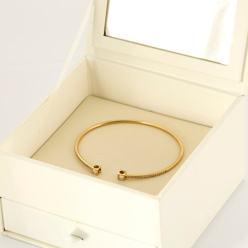 Bracelet Dinh Van - Bracelet le cube, or jaune et diamants. Moyen modèle 58 Facettes DV16479-1