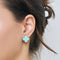 Boucles d'oreilles VAN CLEEF & ARPELS - Boucles d'oreilles Vintage Alhambra or blanc et turquoise 58 Facettes DV0830-23