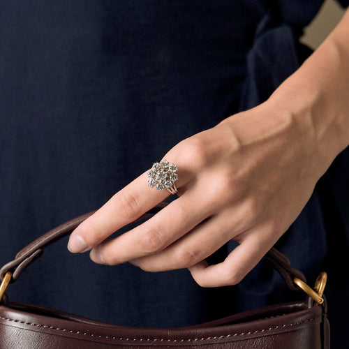Bague marguerite en platine, or blanc et diamants