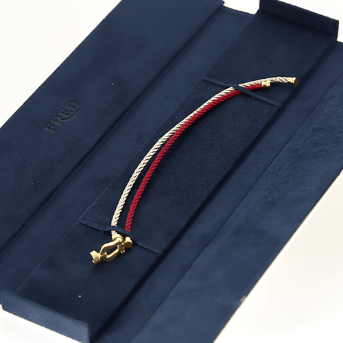 Bracelet FRED - Force 10 - Bracelet en or jaune et cordon en acier 58 Facettes DV17381-7