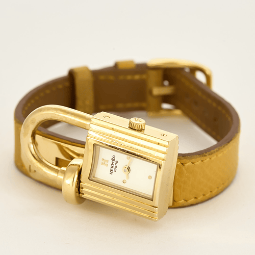 Montre HERMES - Kelly - Montre cadenas métal doré à mouvement quartz 58 Facettes DV17875-1