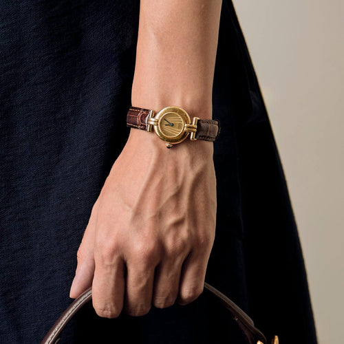 Montre Must de CARTIER - Colisée - Montre en argent plaqué or à mouvement quartz 58 Facettes DV8953-9