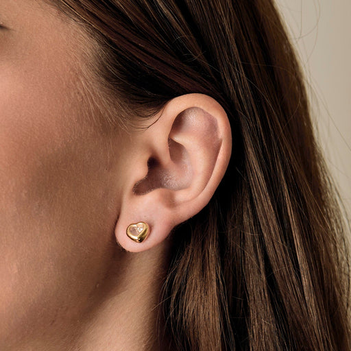 Boucles d'oreilles CHOPARD - HAPPY DIAMONDS - Paire de boucles d'oreilles en or jaune et diamants 58 Facettes DV16125-1