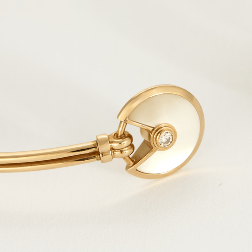 Bracelet CARTIER - Amulette - Bracelet jonc ouvert en or rose, onyx, nacre et diamants 58 Facettes DV18320-2