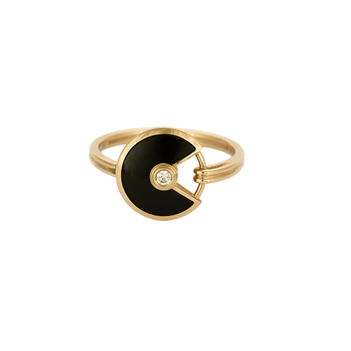CARTIER - Amulette - Bague en or rose, onyx et diamants