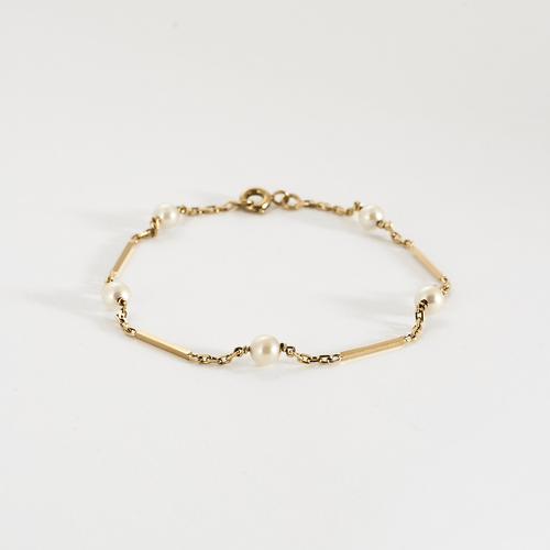 Bracelet Bracelet en or jaune et perles blanches 58 Facettes DV11262-15