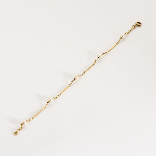 Bracelet Bracelet en or jaune et perles blanches 58 Facettes DV11262-15