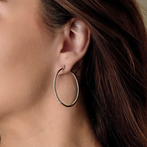 Paire d'anneaux d'oreilles en or blanc et diamants 58 Facettes DV17385-4