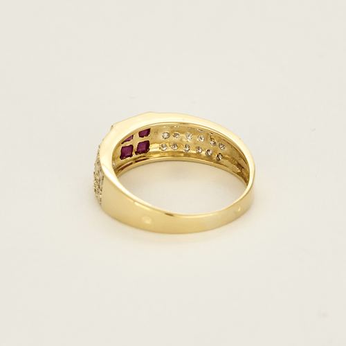Bague en or jaune, rubis calibrés et diamants